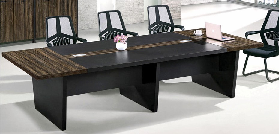 Dark wood conference table with black mesh chairs and matching credenza